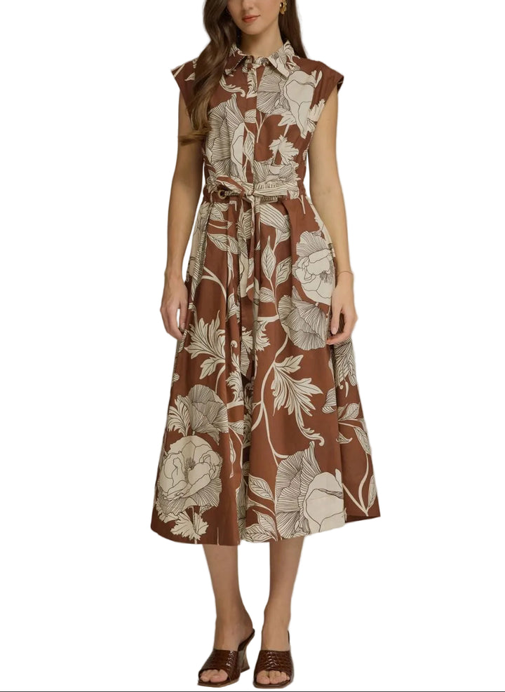 Effortless elegance meets timeless style with the Shannon Floral Midi Dress. This versatile piece features a charming floral print on a rich brown base, perfect for transitional seasons and layered styling. The self-tie belt cinches at the waist to create a flattering silhouette you can customize to your comfort. Ideal for brunch, casual outings, or dressed up for evening occasions. A wardrobe essential that works as hard as you do.
