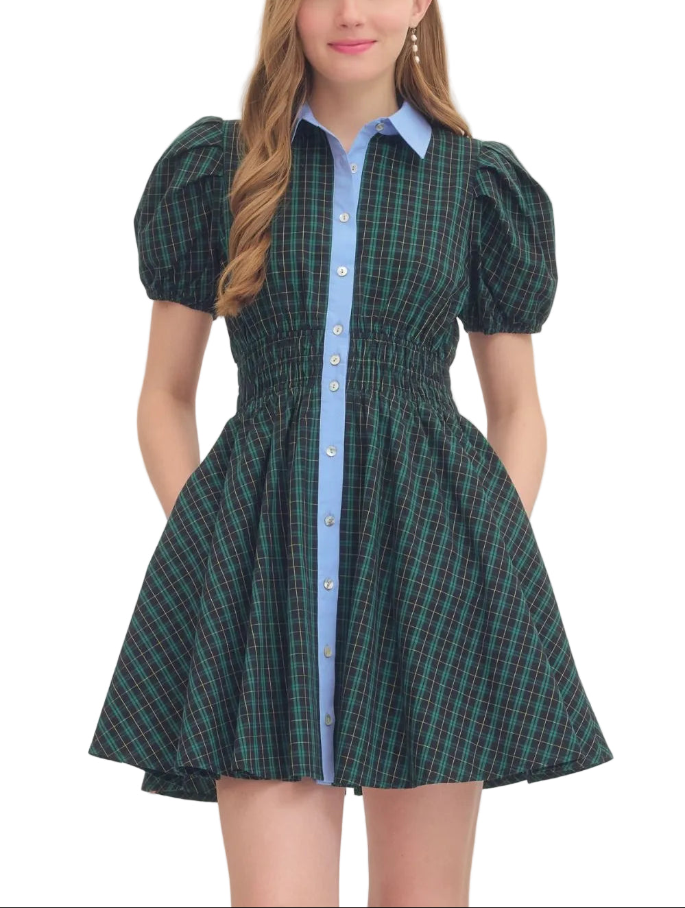 Plaid short puff sleeve mini dress featuring contrast collar. Button closure at front. Smocked waist. Side pockets. Lined. Woven. Non-sheer. Lightweight.