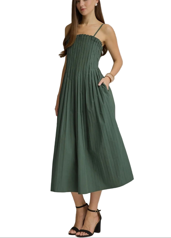 Solid sleeveless midi dress with a straight neckline and pleated bodice detail. Adjustable straps. Smocked back. Back zipper. Side pockets. Lined. Woven. Non-sheer. Lightweight.