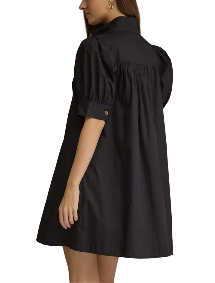 Solid short puff sleeve mini dress with a shirt collar and button closure at front. Button cuffs. Side pockets. Lined. Woven. Non-sheer. Lightweight.