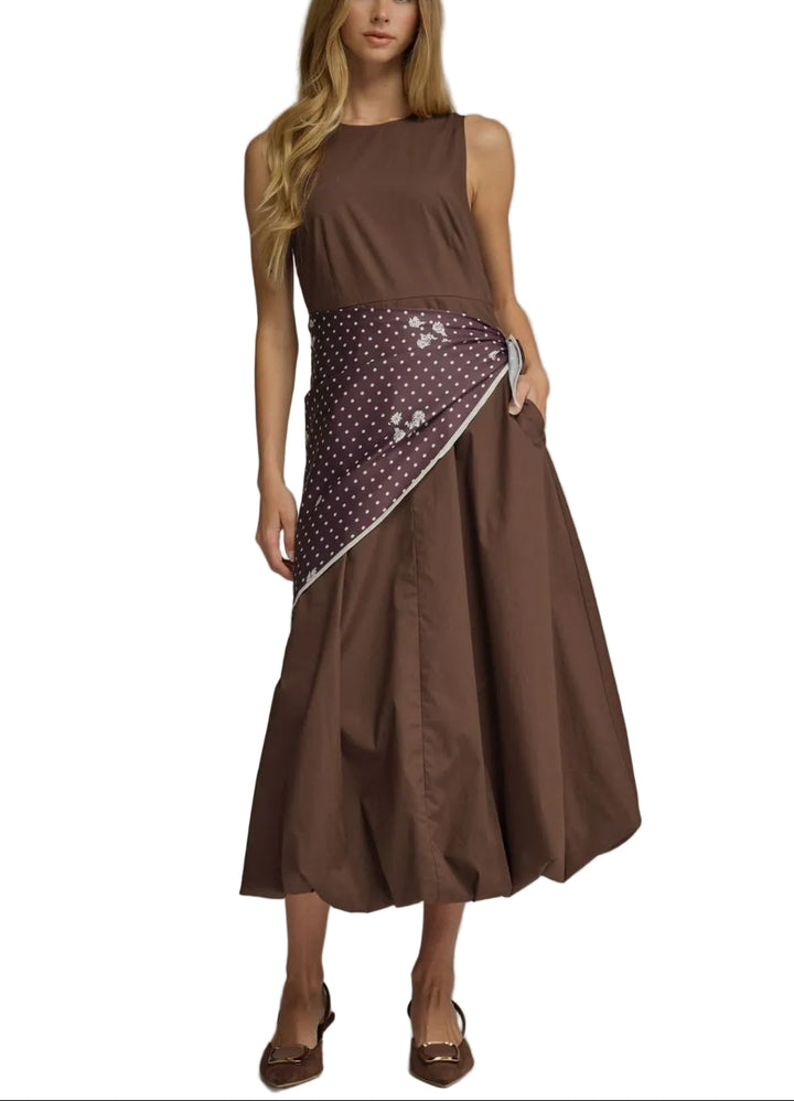 Effortless elegance meets versatile style with the Chloe Midi Sleeveless Dress. This timeless piece features a sleek sleeveless silhouette that transitions seamlessly from day to evening. The included scarf ties gracefully around the waist, adding dimension and allowing you to customize your look. Perfect for warm weather occasions, professional settings, or casual outings. The midi length provides sophisticated coverage while maintaining a modern, flattering fit. 