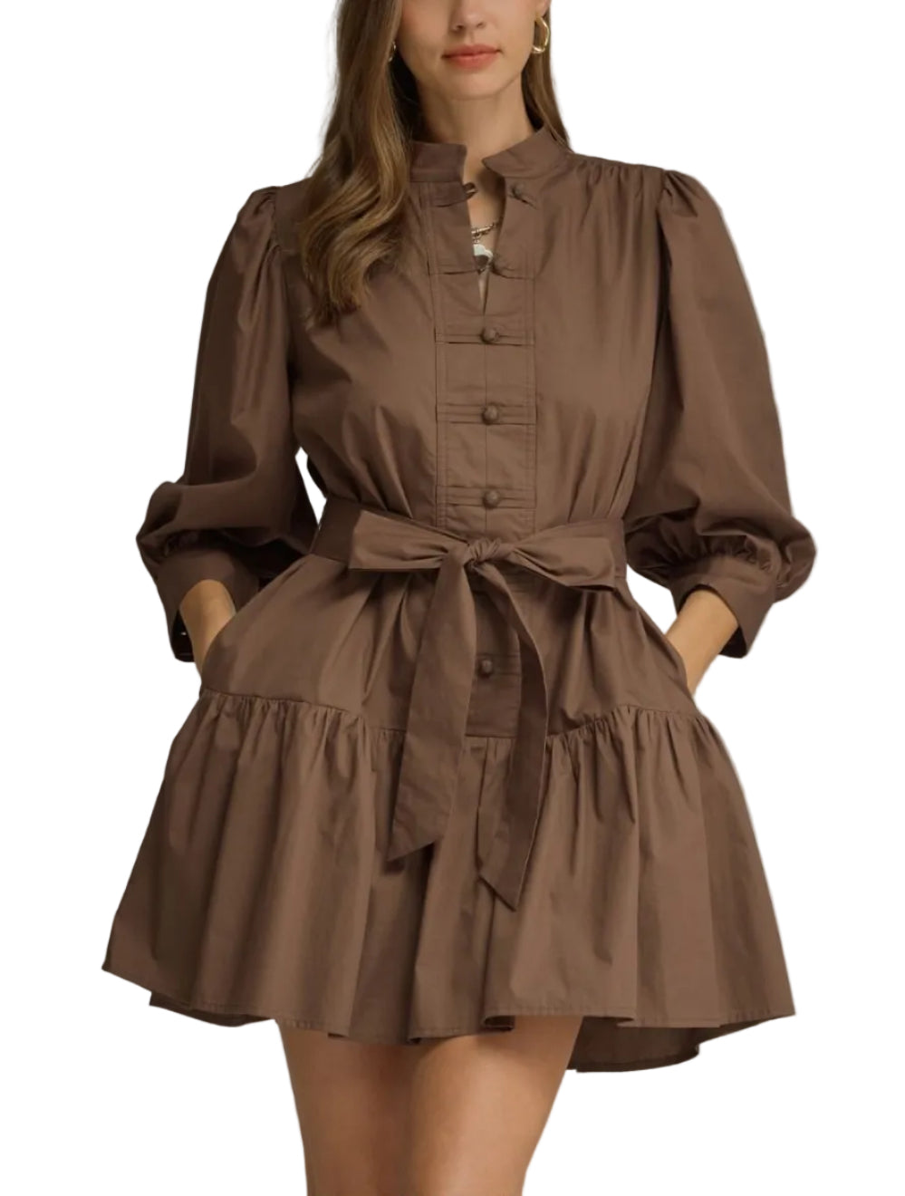 Solid ¾ balloon sleeve mini dress with a stand collar and split neckline. Button closure at front. Removable self-tie belt. Side pockets. Tiered skirt. Button cuffs. Lined. Woven. Non-sheer. Lightweight.
