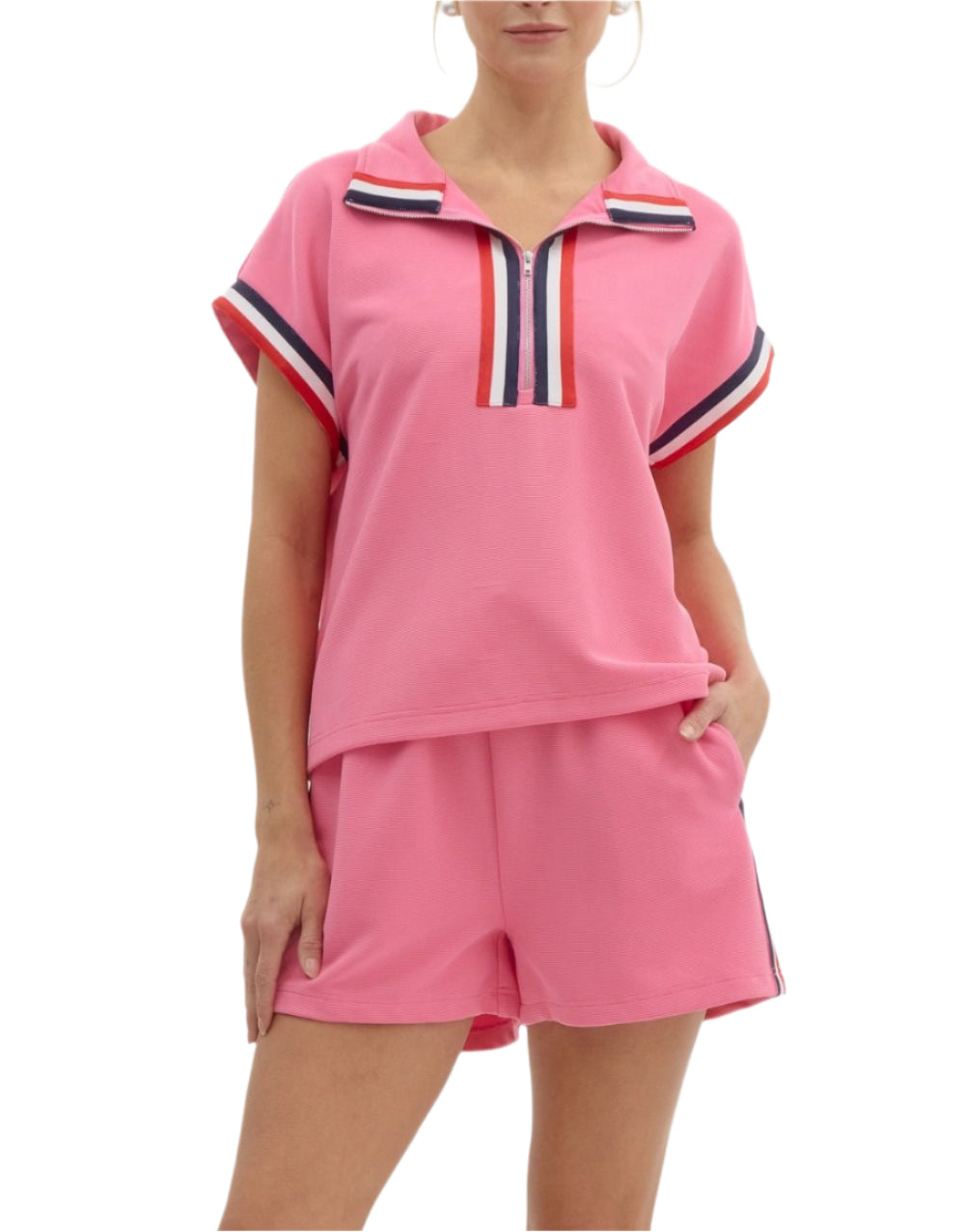 Solid rib textured jersey knit front half-zip closure pullover muscle tee top featuring accented multicolor band. Unlined. Knit. Non-sheer. Lightweight.