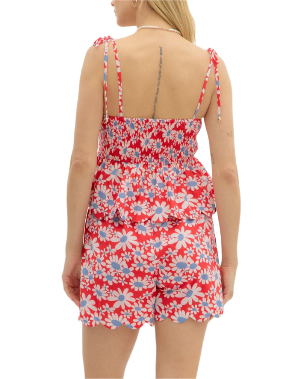Floral print shoulder tie ruffle hem pullover top featuring scallop hem and neck finish. Smocking closure at back. Lined. Woven. Non-sheer. Lightweight.

Floral print high waist pull-on shorts featuring scallop hem. Adjustable elasticated waistband. Pockets at sides. Lined. Woven. Non-sheer. Lightweight.