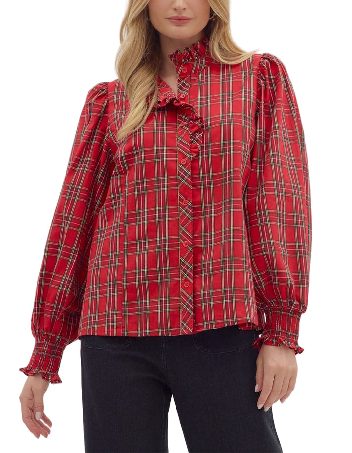 Plaid long sleeve blouse featuring ruffle-accented button-down front. High ruffle neck. Smocked elasticized cuffs. Unlined. Woven. Non-sheer. Lightweight.
