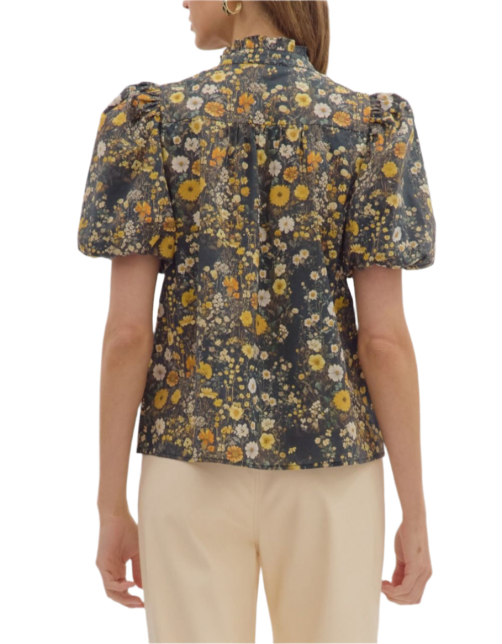 Floral print ruffle band colllar short bubble sleeve top featuring ruffle smocked frill accent button closure at front. Unlined. Woven. Non-sheer. Lightweight.
