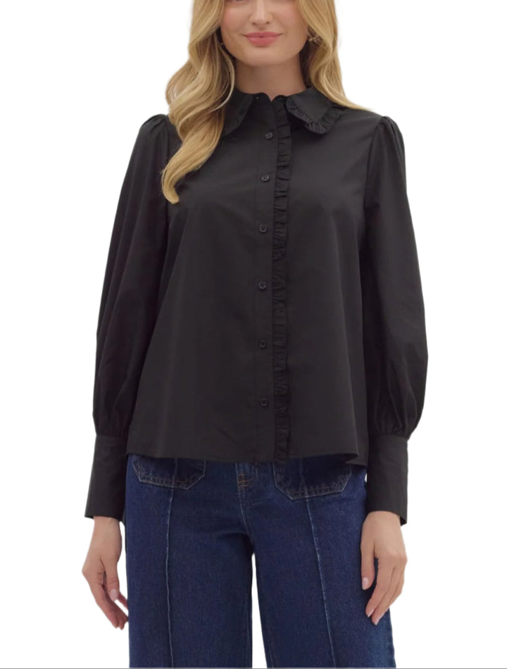 Solid long shirt sleeve collar button closure top featuring ruffle accent detailing. Unlined. Woven. Non-sheer. Lightweight.