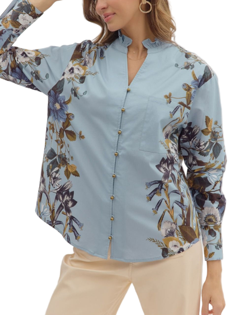 Floral print long shirt sleeve top featuring floral accent sleeves. Ruffle finish V-neck button closure front. Unlined. Woven. Non-sheer. Lightweight.
