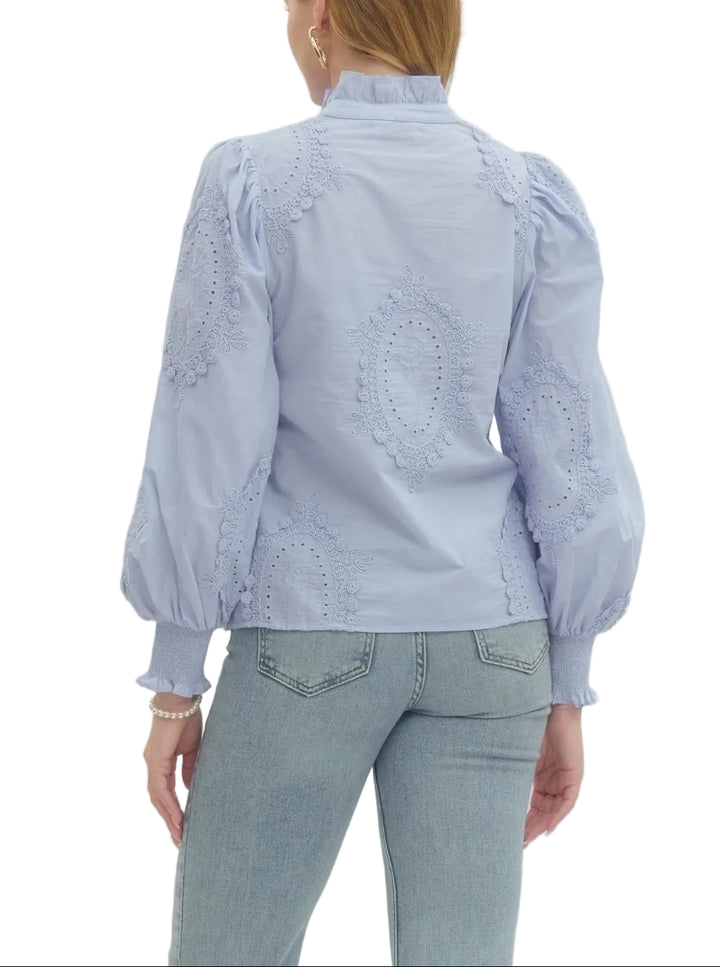 Elevate your everyday style with the Delaney Long Sleeve Top, a charming piece that brings personality to your wardrobe. This thoughtfully designed top features delicate embroidered appliqué work paired with sweet eyelet detailing, creating visual interest and texture that catches the eye. The long sleeves offer versatile coverage perfect for layering or wearing solo, making it an ideal choice for transitional seasons or cooler days. 