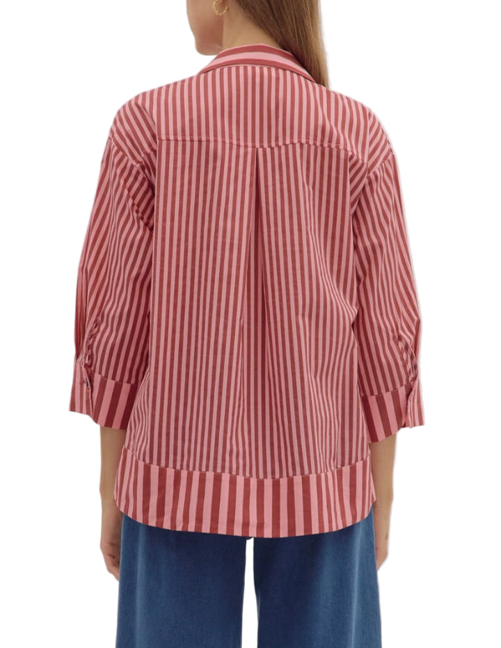 Stripe print 3/4 sleeve top featuring wide collar and pearl button at hidden placket. Button closures at cuffs. Unlined. Woven. Non-sheer. Lightweight.
