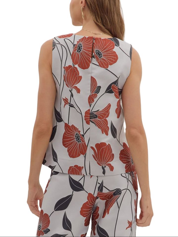 Brighten your wardrobe with the Betsy Pant Set—a fun floral sleeveless top paired perfectly with matching pants. This playful duo offers effortless style and comfort, ideal for sunny days or casual outings where you want to stand out with ease and charm.