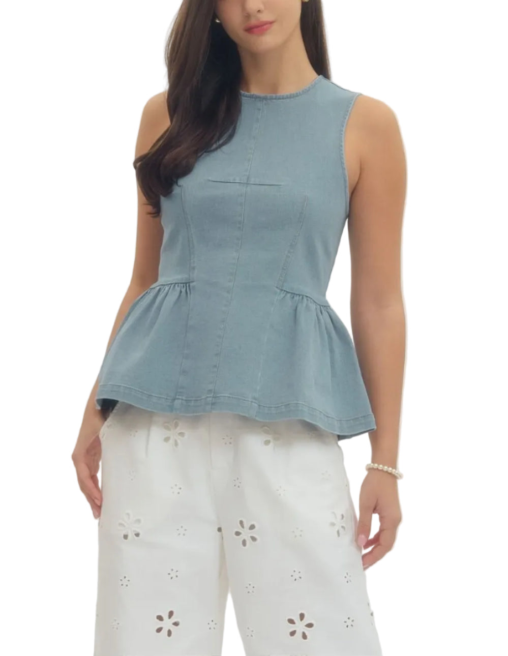 Solid sleeveless peplum top featuring contrast topstitch detail. Back zipper closure. Unlined. Woven. Non-sheer. Lightweight.
