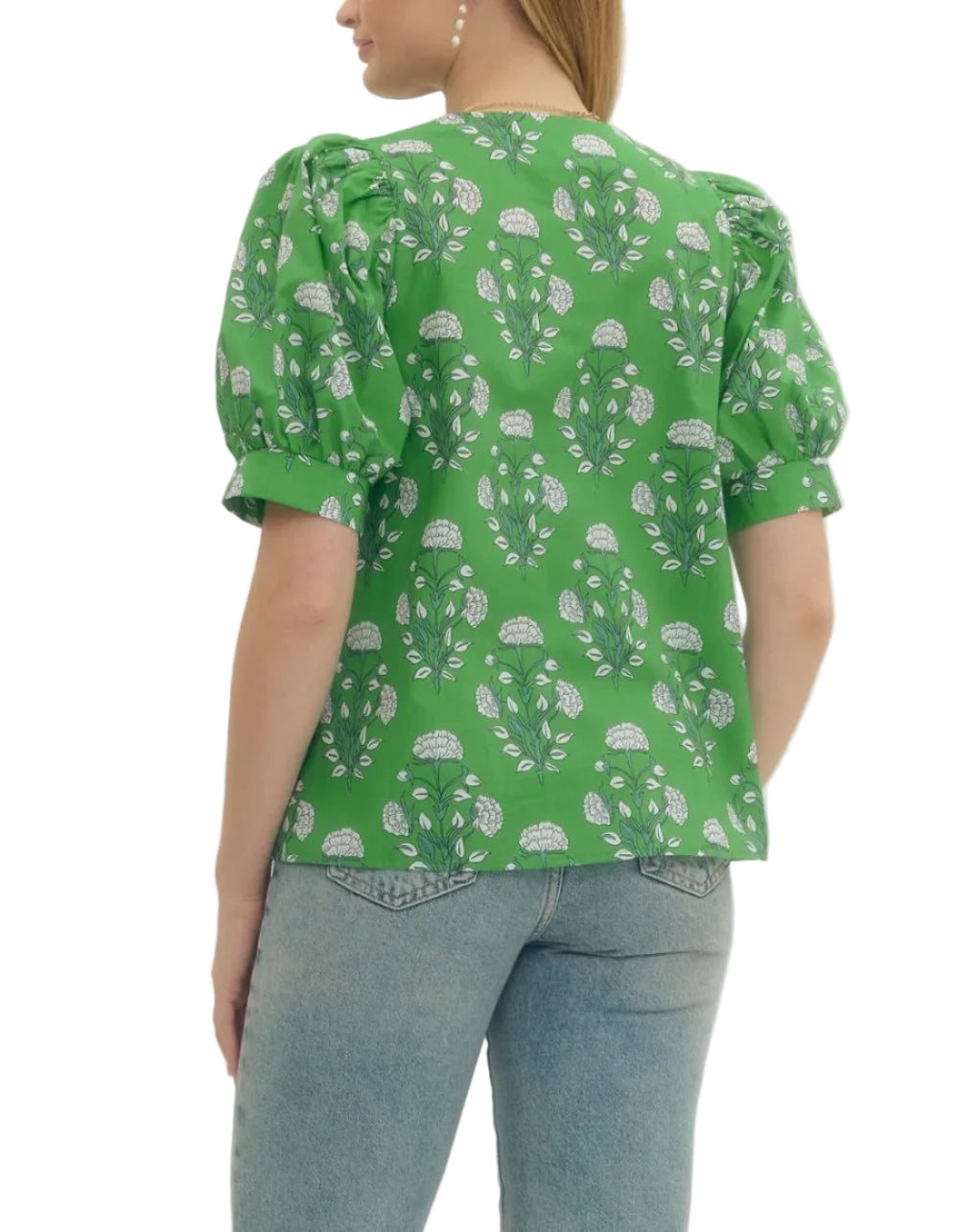 Floral print puff short sleeve top featuring V-neck with knotted applique detail. Unlined. Woven. Non-sheer. Lightweight.
