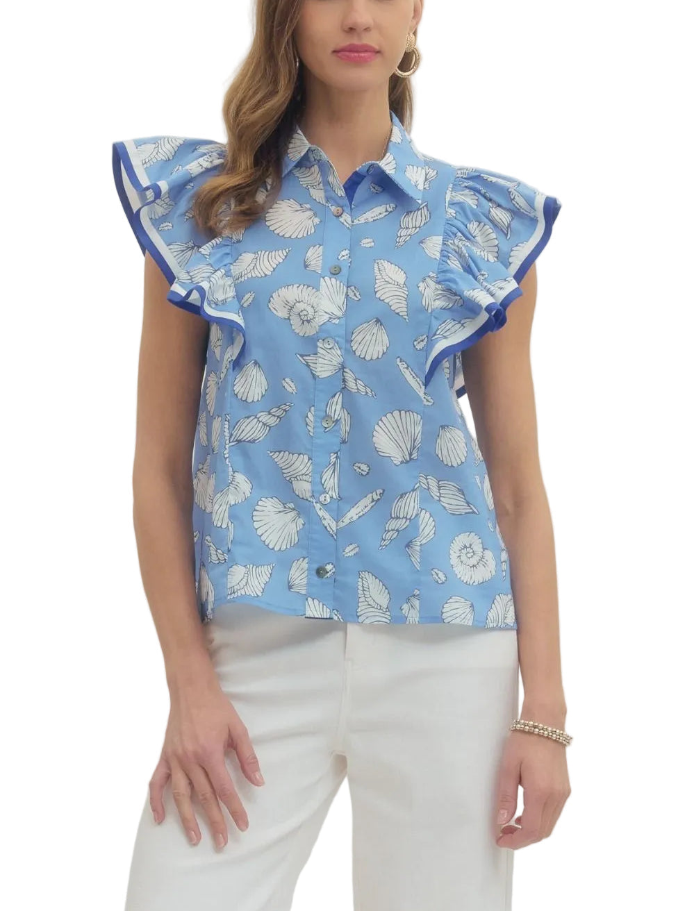 Shell print flutter short sleeve top featuring contrast binding ruffle detail. Button closure at front. Unlined. Woven. Non-sheer. Lightweight.