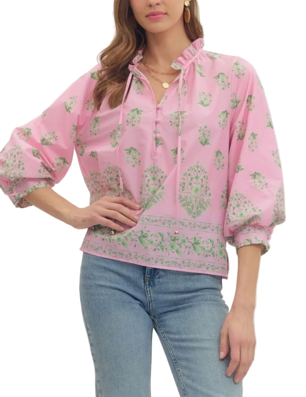 Botanical print balloon 3/4 sleeve top featuring ruffle split neckline with button placket. Button closure at cuff. Unlined. Woven. Non-sheer. Lightweight.
