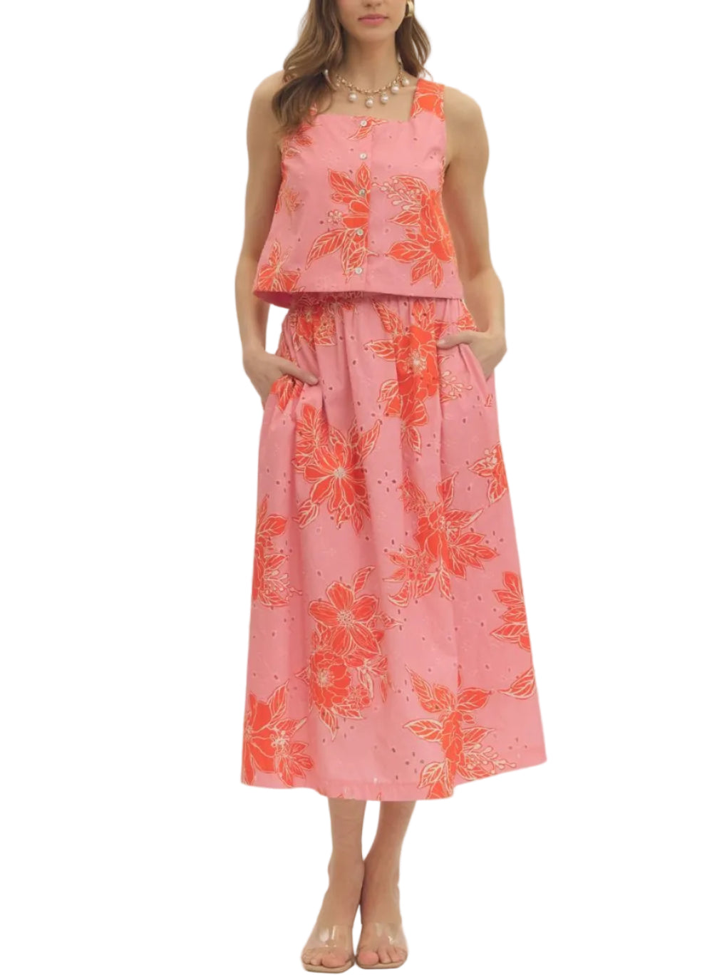 Botanical print midi skirt featuring eyelet fabric. Elasticated back waistband. Side pockets. Lined. Woven. Non-sheer. Lightweight.
