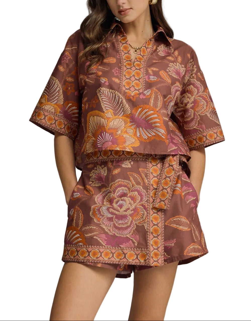 Botanical print wrap front skort featuring side tie detail. Elasticated waistband at back. Lined. Woven. Non-sheer. Lightweight.