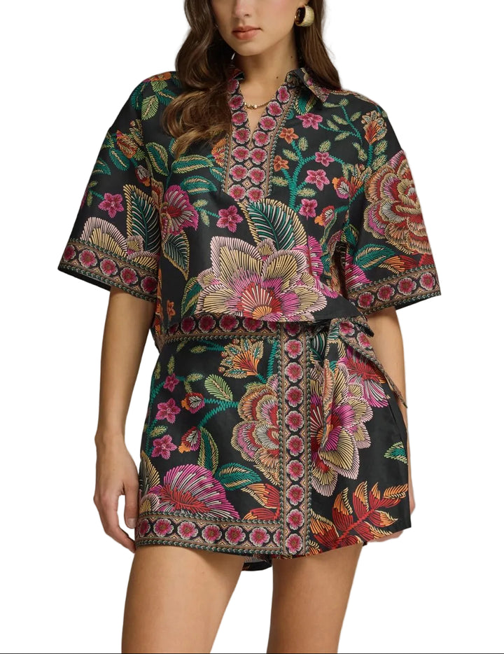 Botanical print wrap front skort featuring side tie detail. Elasticated waistband at back. Lined. Woven. Non-sheer. Lightweight.