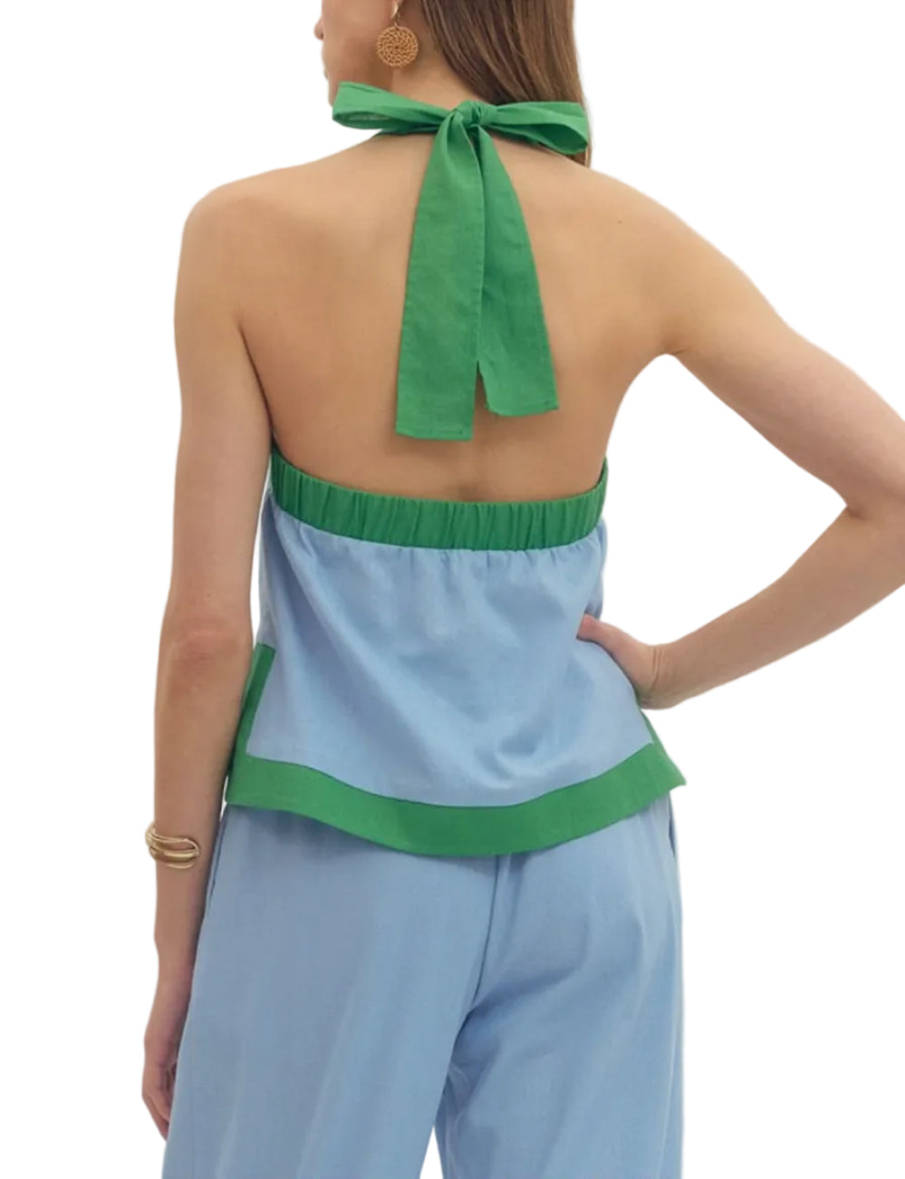 Solid halter sleeveless top featuring contrast binding and matching pants. Unlined. Woven. Non-sheer. Lightweight.