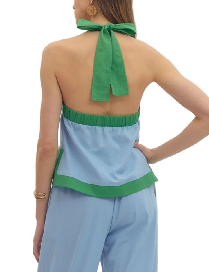 Solid halter sleeveless top featuring contrast binding and matching pants. Unlined. Woven. Non-sheer. Lightweight.