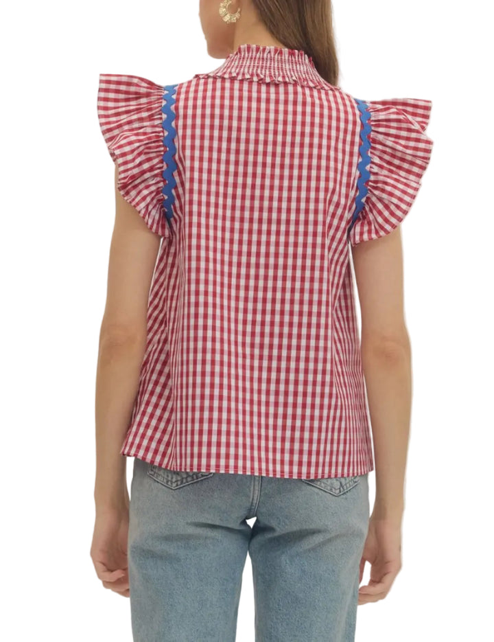 Check print flutter sleeve top featuring contrast scallop trim. Ruffle collar. Split neck. Unlined. Woven. Non-sheer. Lightweight.