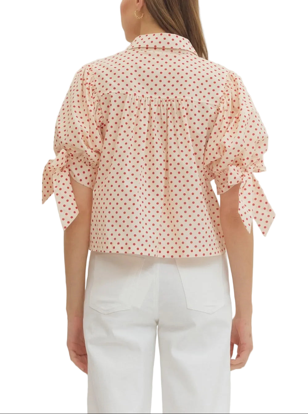 Polka dot short puff sleeve top featuring scallop trim button closure at front. Collar. Self-tie sleeve cuffs. Unlined. Woven. Non-sheer. Lightweight.