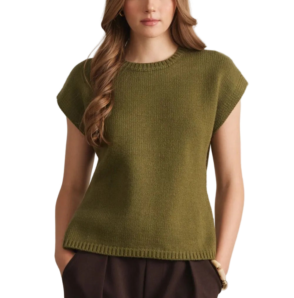 The Fiona Short Sleeve Sweater offers effortless layering for warm weather. Crafted from soft, breathable fabric, this versatile piece transitions seamlessly from office to weekend. The classic short sleeve design provides comfort without bulk, while the timeless silhouette pairs easily with jeans, skirts, or trousers. Perfect for spring and summer wardrobes.