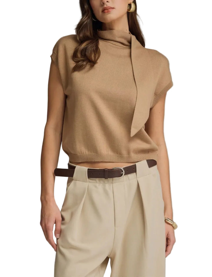 Solid mock neck cap sleeve knit top featuring scarf tie detail. Button closure at back neck. Unlined. Knit. Non-sheer. Lightweight.
