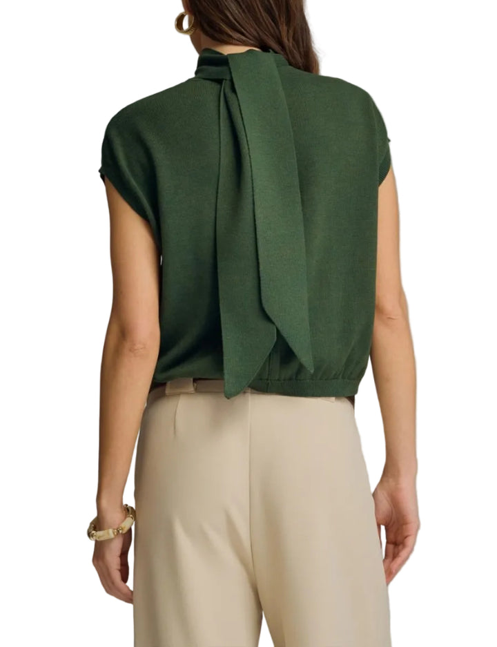Solid mock neck cap sleeve knit top featuring scarf tie detail. Button closure at back neck. Unlined. Knit. Non-sheer. Lightweight.
