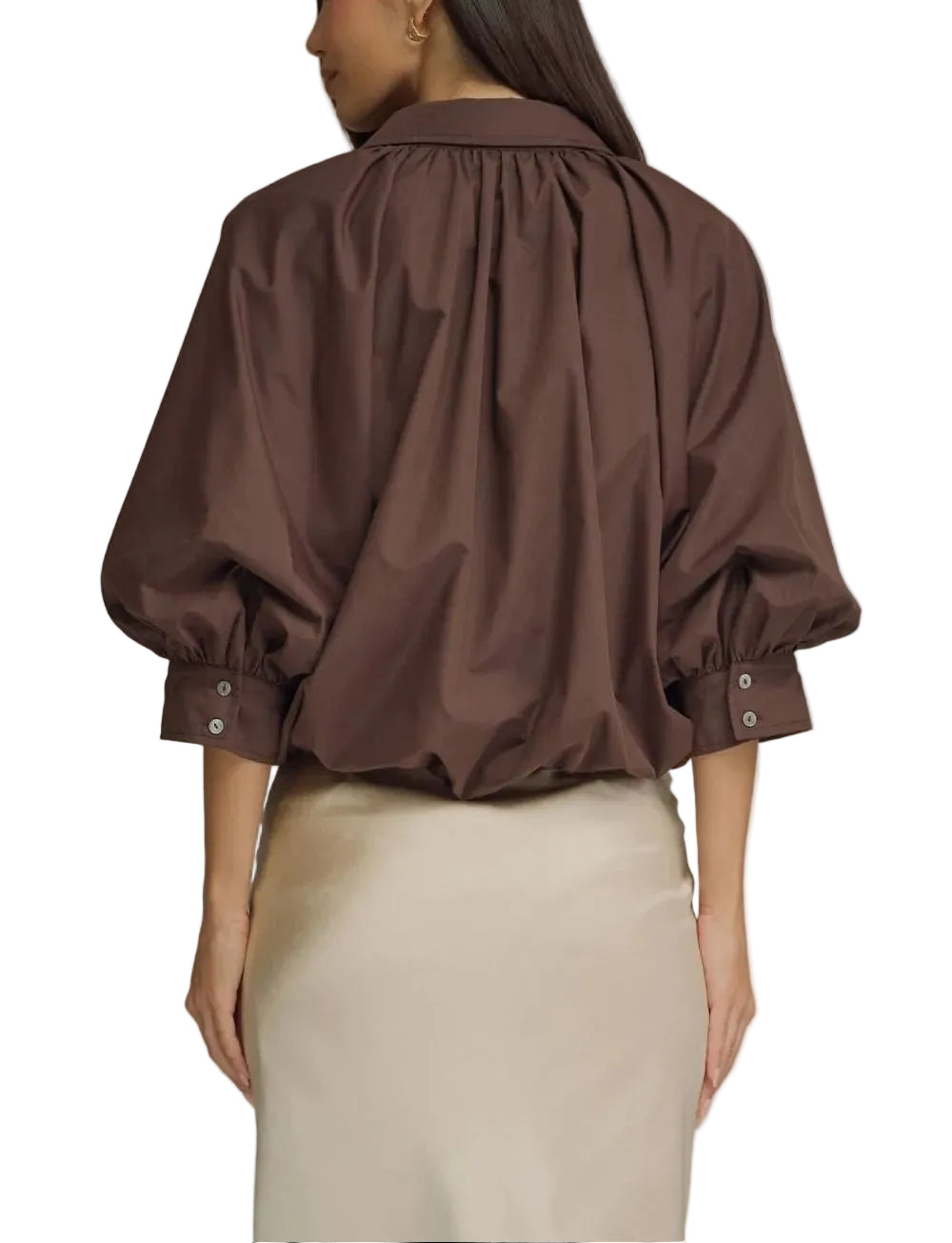 Solid ¾ puff sleeve top featuring gathered detail at front and back yoke. Button closure at front. Button at cuff. Elasticated hem. Lined. Woven. Non-sheer. Lightweight.