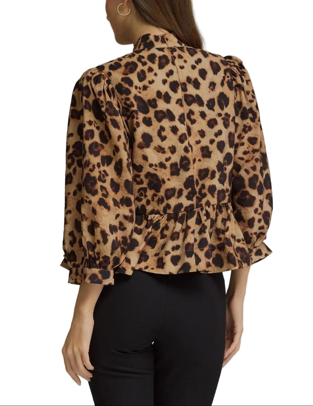 Animal print 3/4 puff sleeve top with a high neckline. Frog button closure at front. Back zipper. Peplum hem. Unlined. Woven. Non-sheer. Lightweight.
