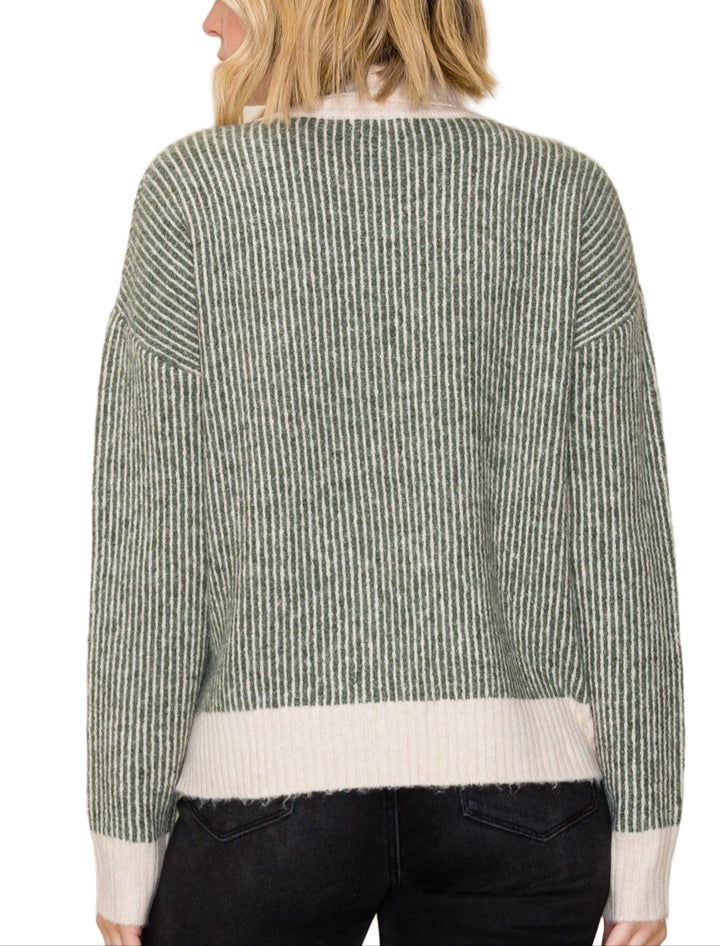 Stay cozy and chic with the Jessica 2 Tone Ribbed Turtleneck Sweater! Its playful blend of two tones adds a fun twist to your fall wardrobe, while the ribbed texture ensures a flattering fit that keeps you warm. Perfect for layering or wearing solo, this sweater brings a splash of style to any casual outing.