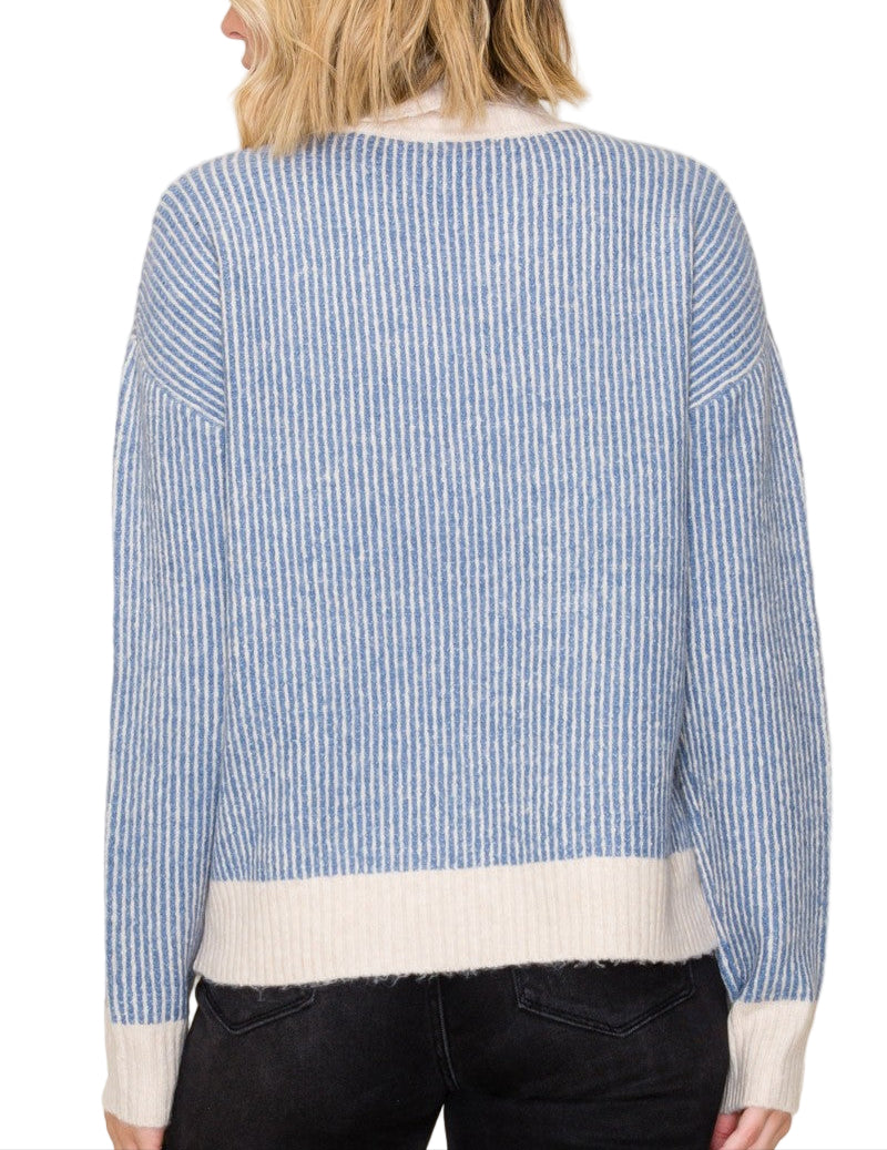 Stay cozy and chic with the Jessica 2 Tone Ribbed Turtleneck Sweater! Its playful blend of two tones adds a fun twist to your fall wardrobe, while the ribbed texture ensures a flattering fit that keeps you warm. Perfect for layering or wearing solo, this sweater brings a splash of style to any casual outing.