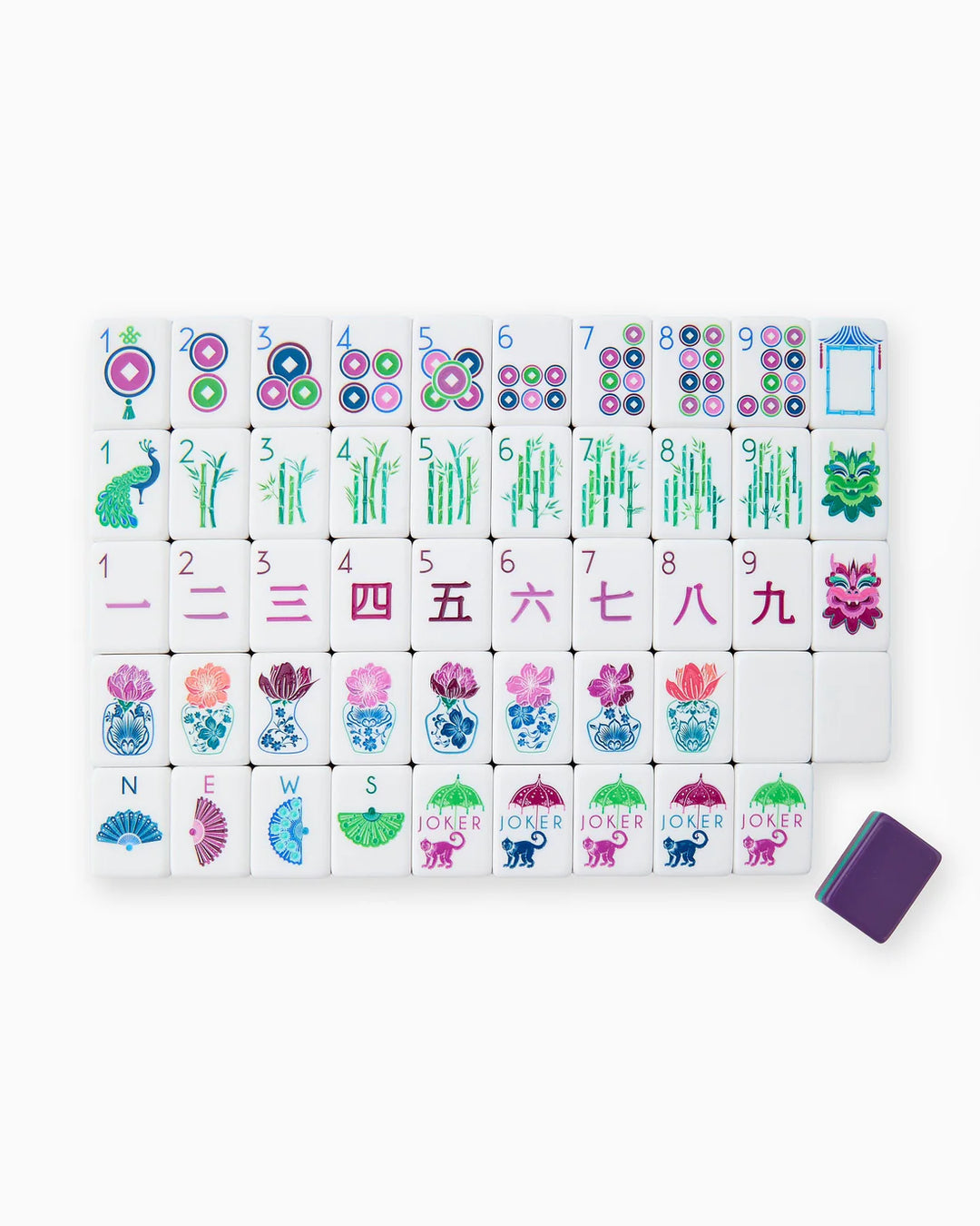 Inspired by the brilliance of precious gemstones, the Gemma Tiles bring a rich, luxurious feel to your mahjong game. With a stunning jewel-toned palette of deep purple, emerald green, and berry, this set captures the elegance and allure of amethyst, emerald, and garnet. Whether playing for fun or aiming for a winning hand, the Gemma Tiles add a touch of opulence and sophistication to every game night.

What's included: Tiles, a Dice/Coin Bag, and 4 Instructional Cards (you must purchase the NMJL Playing Car