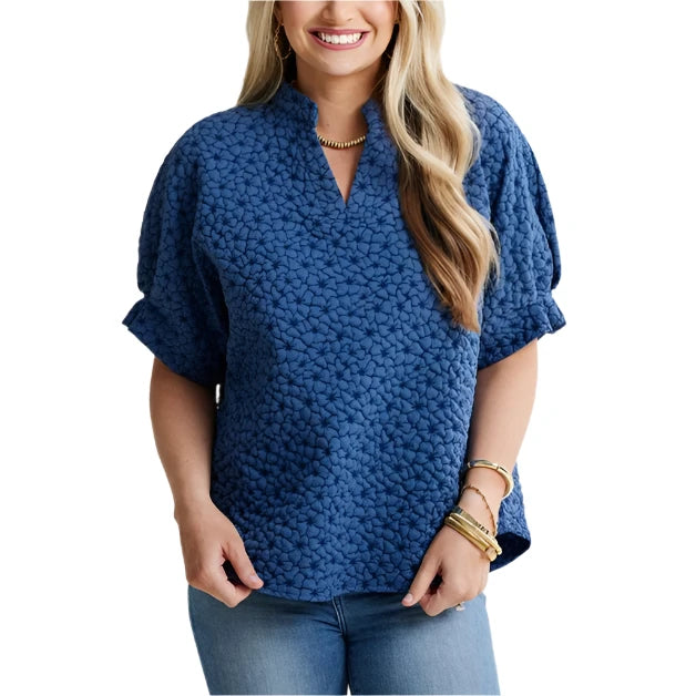 Introducing the Annie Quilted Top! This new style features a playful floral design that will add a touch of flair to your look! 

Gathered Sleeve Detail

Lightweight Quilted Material