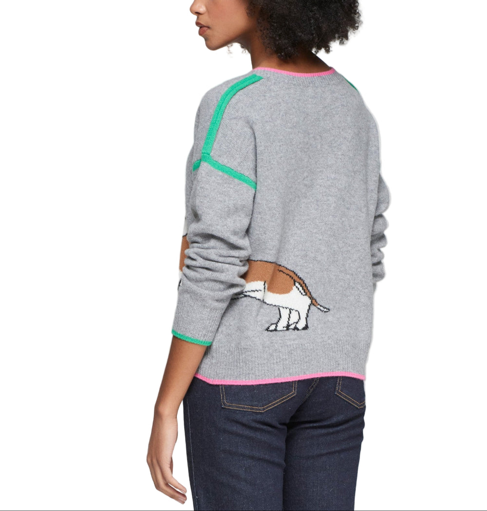 Grey wool knit sweater featuring an intarsia dachshund design on both sides. V-neckline trimmed in pink, with green accent stripes on shoulders and cuffs. Made from 100% wool with a soft touch and light structure. Straight cut with pink hem and natural drape.