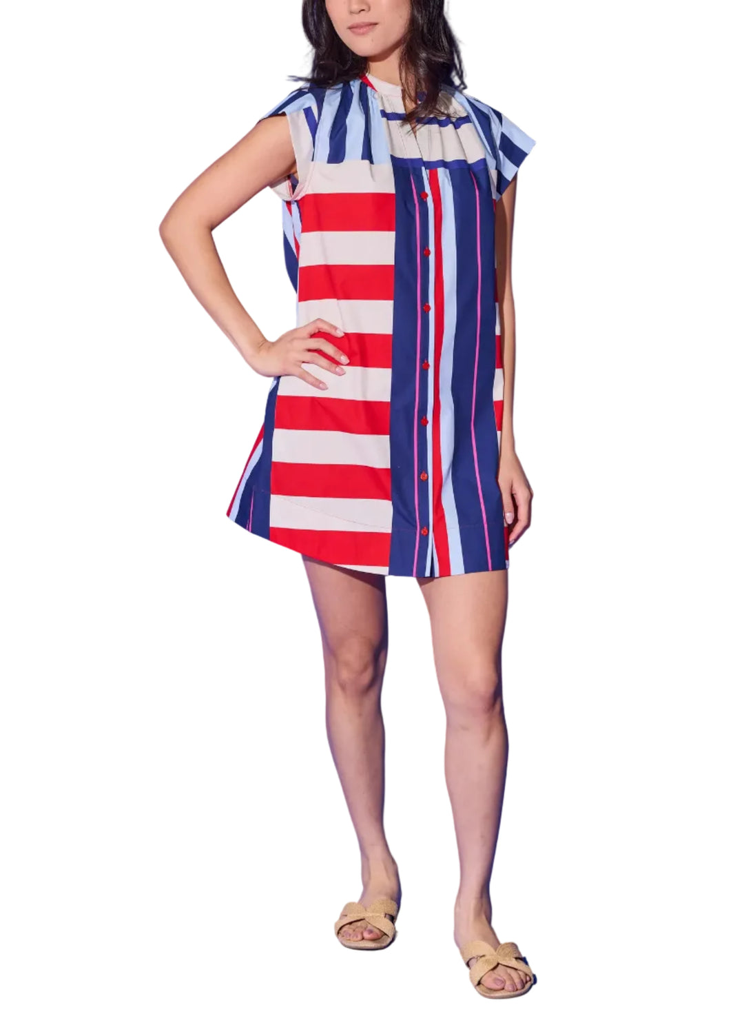 A bold mix-and-match stripe moment, the Tucker Dress is anything but ordinary. A playful clash of horizontal red-and-cream stripes and vertical navy-and-pink stripes come together in a striking color-blocked design that&