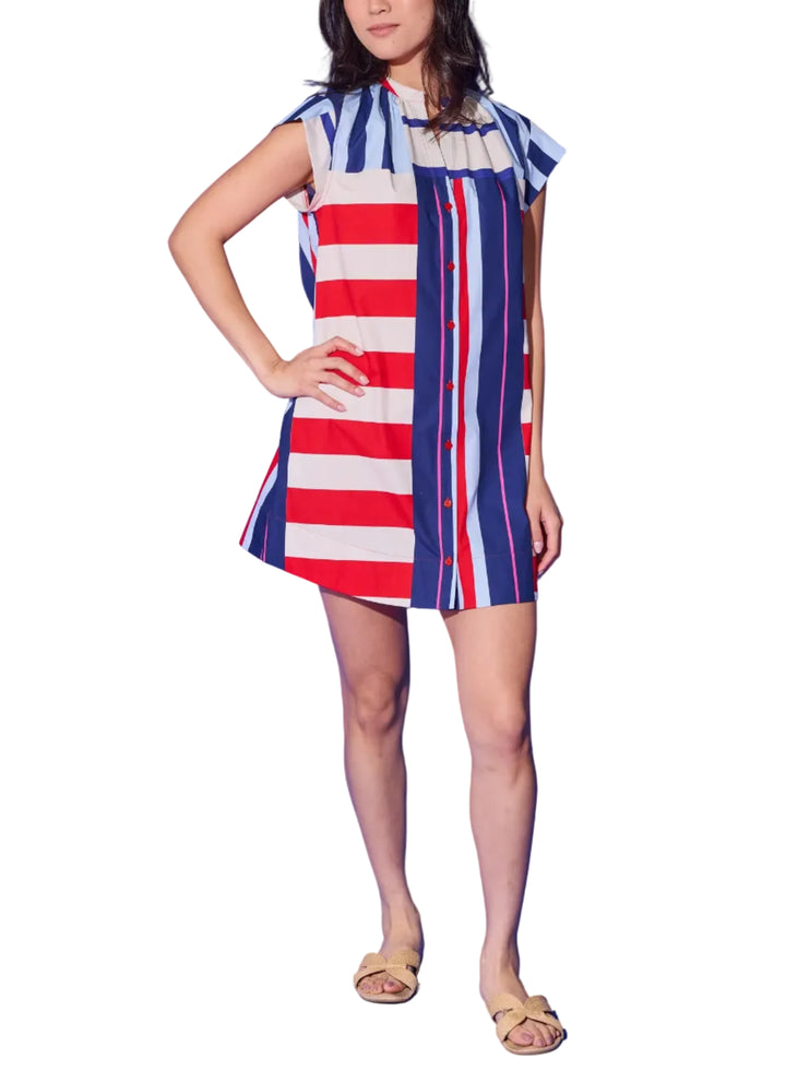 A bold mix-and-match stripe moment, the Tucker Dress is anything but ordinary. A playful clash of horizontal red-and-cream stripes and vertical navy-and-pink stripes come together in a striking color-blocked design that&