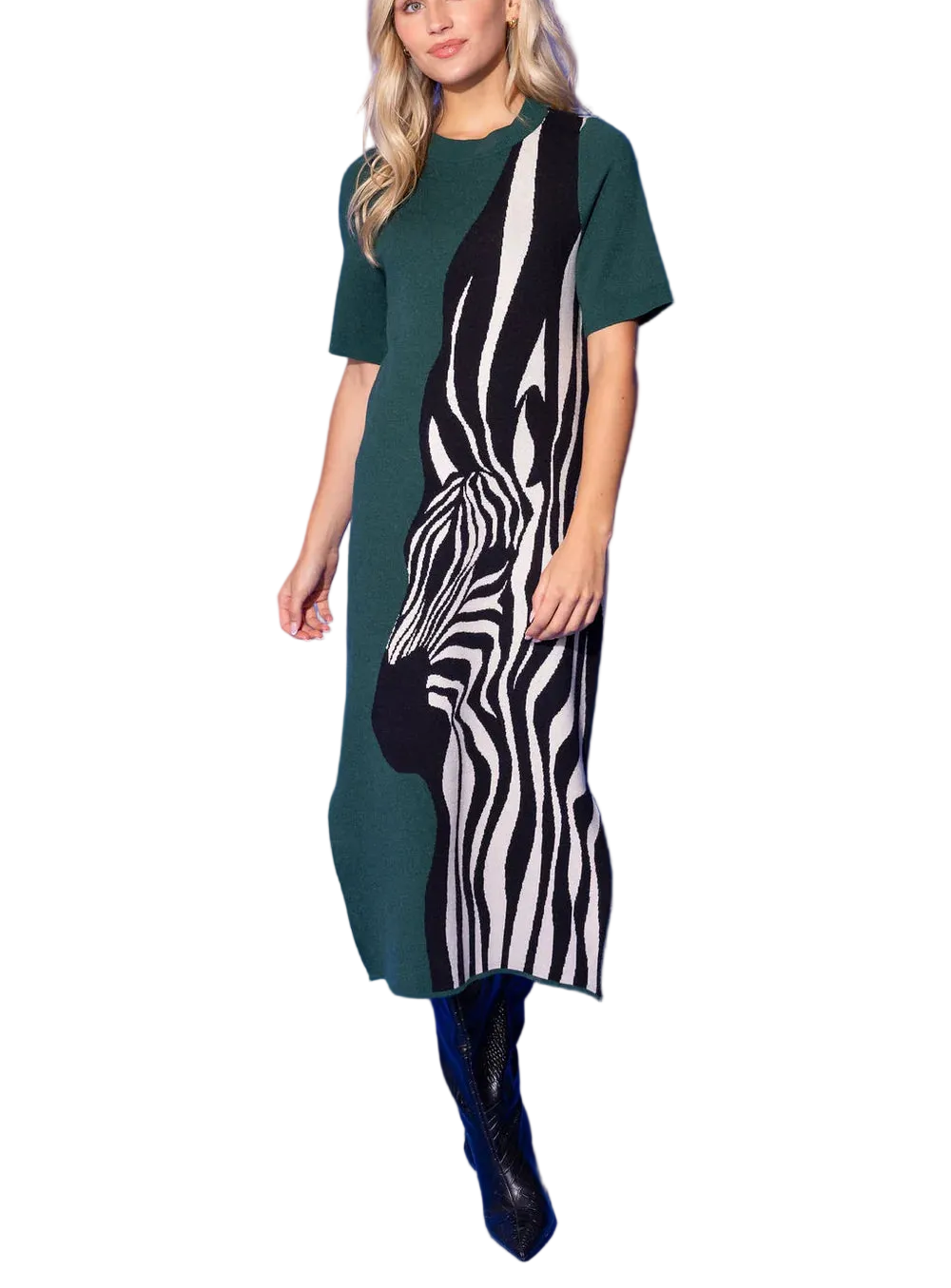 The Scout Dress in Wild Silhouette is a striking fusion of bold and refined. A dramatic oversized zebra motif in graphic black and cream sweeps across one side of this sleek knit midi, while a rich forest green grounds the other side in a chic, unexpected color-block contrast that&