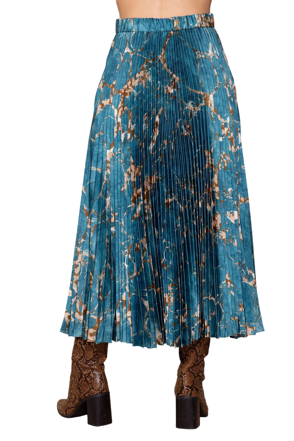 A pleated midi skirt in teal blue with a brown and beige marble pattern, shown on a model wearing brown snakeskin boots against a solid beige background.