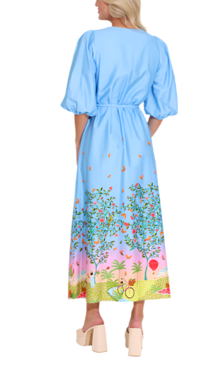 Introducing the Lizzie Dress! In our stunning promenade color way, this dress offers a v neckline, puff sleeves, a braided tassel belt and maxi skirt.

Fabric Content: 98% Cotton, 2% Spandex
Fabric: Cotton Sateen
Machine wash cold. Tumble dry low.
Model is wearing a size Small
