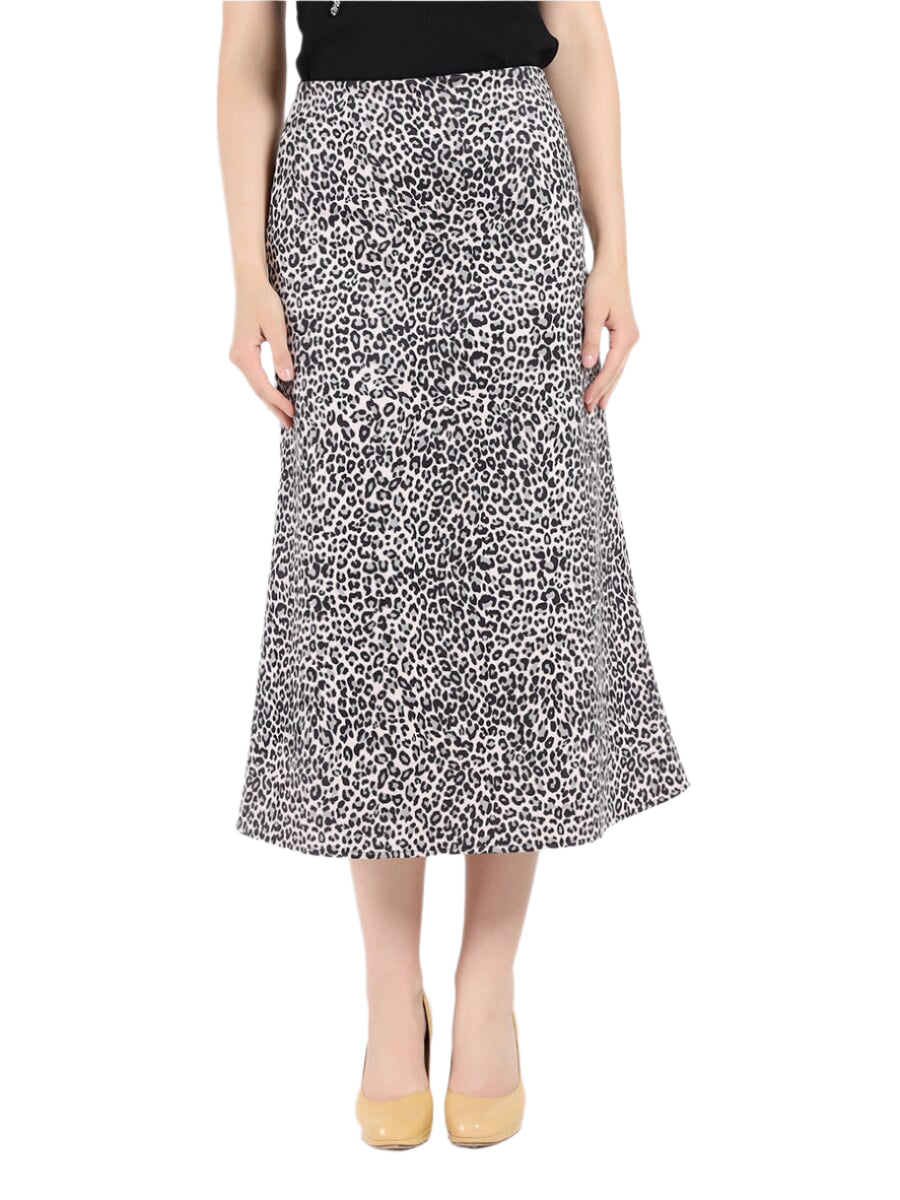 Turn heads with this playful leopard print suede midi skirt. Its soft suede texture adds a touch of luxury, while the bold print brings out your wild side.