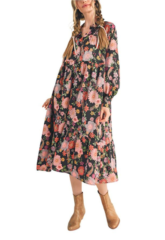 Welcome cool Fall days in this floral button-up tiered midi dress! The oversized shift silhouette has pockets, a functional button placket down the center, and asymmetrical tiered detail before ending at a midi hem. Pair with sneakers or booties for an effortlessly chic Fall ‘fit!