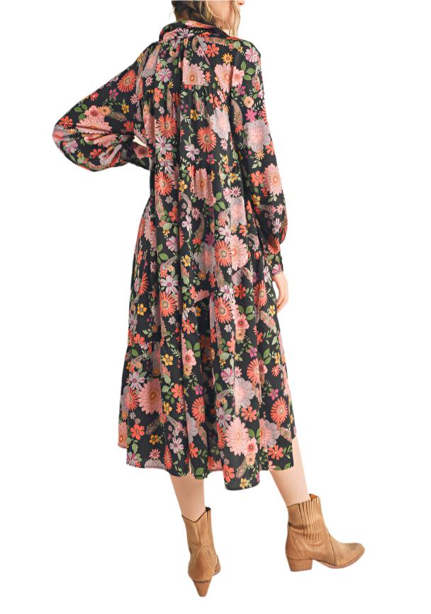 Welcome cool Fall days in this floral button-up tiered midi dress! The oversized shift silhouette has pockets, a functional button placket down the center, and asymmetrical tiered detail before ending at a midi hem. Pair with sneakers or booties for an effortlessly chic Fall ‘fit!