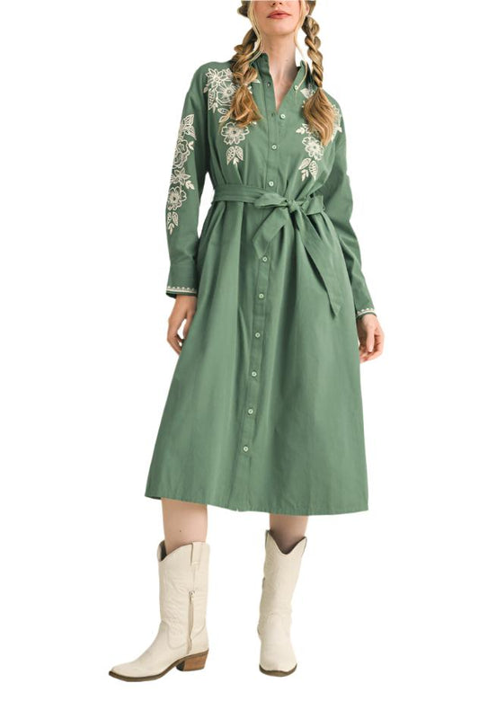 Channel those western boho vibes in this embroidered button down midi dress! Woven fabric shapes this femme dress that has a collared neckline and drop shoulder long sleeves. Full button placket continues past a belted waist (with removable sash belt) to a midi hem.Gorgeous floral embroidery adds the perfect touch to make this your next go-to favorite!