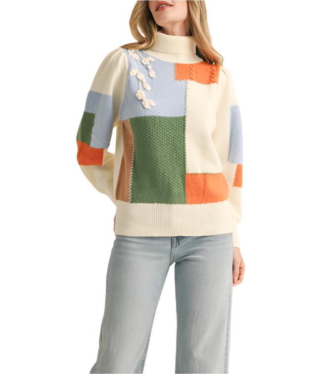 This super snuggly color block patchwork turtleneck is the best way to stay perfectly cozy through the coldest months! Thick and cozy knit, with a color block patchwork design, shapes this pullover that has a ribbed folded turtleneck and a relaxed bodice. Gathered puff shoulders carry into long puff sleeves with fitted cuffs. Pair with jeans and boots for the ultimate cute and cozy look!