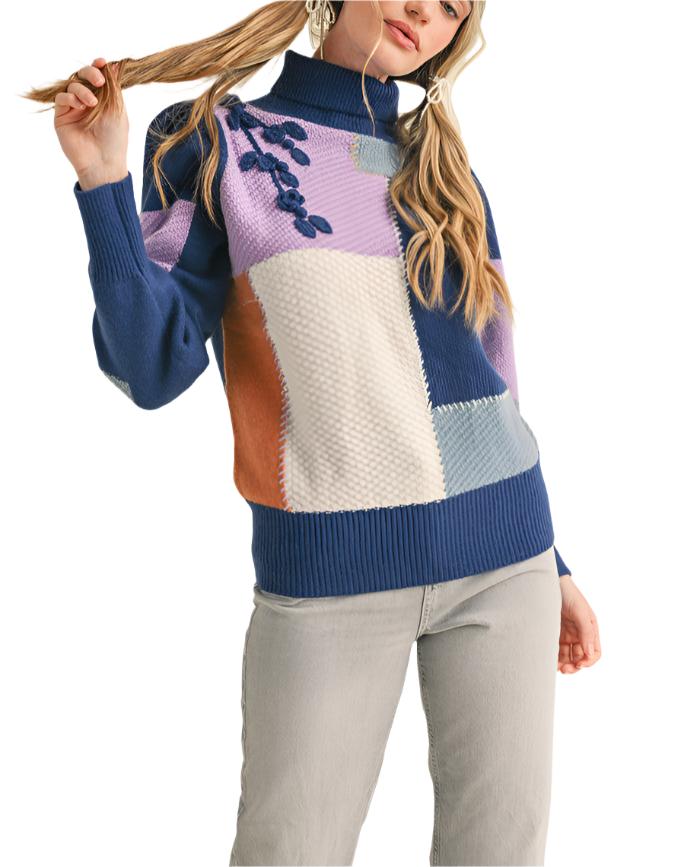 This super snuggly color block patchwork turtleneck is the best way to stay perfectly cozy through the coldest months! Thick and cozy knit, with a color block patchwork design, shapes this pullover that has a ribbed folded turtleneck and a relaxed bodice. Gathered puff shoulders carry into long puff sleeves with fitted cuffs. Pair with jeans and boots for the ultimate cute and cozy look!