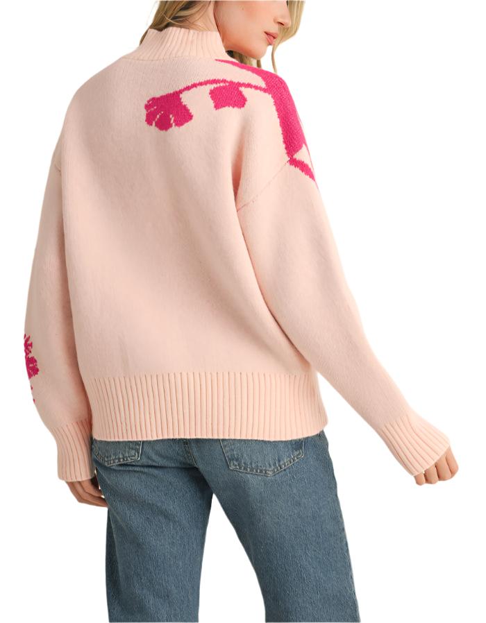 Warm sweater knit shapes this pullover that has cute floral knit detail on the shoulders and sleeves, a mock neckline, long sleeves, and a relaxed bodice.