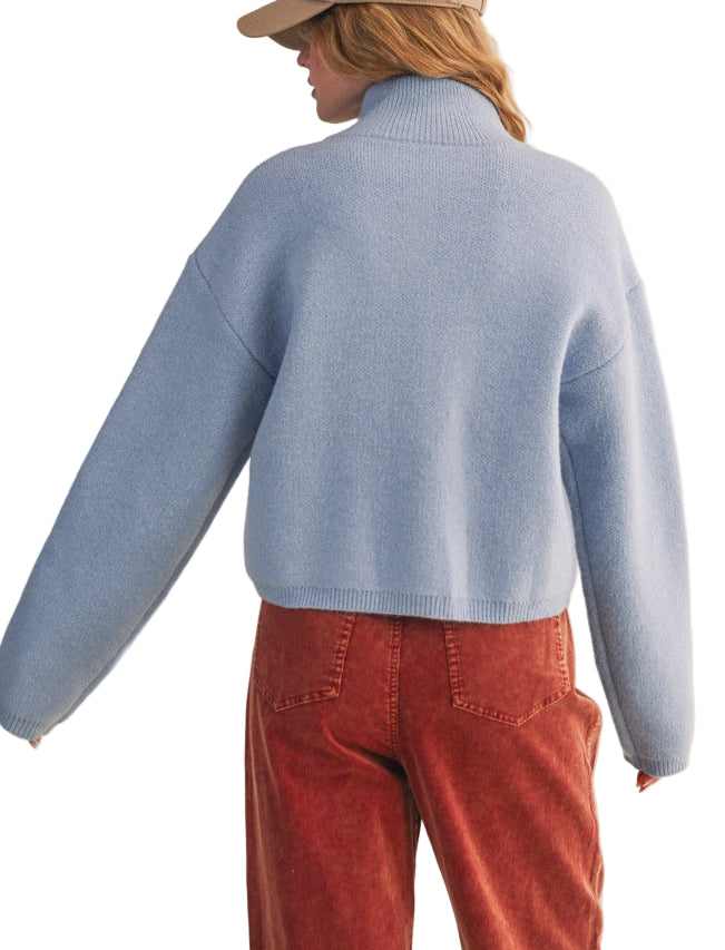 Your outfits will always be casually cute when you've got this zip-up sweater cardigan! Soft and cozy knit shapes long puff sleeves that frame a bodice with a ribbed stand collar, a zip-up closure, and semi-cropped relaxed bodice. Stunning floral knit design gives this cardigan the extra "oomph" your closet needs!