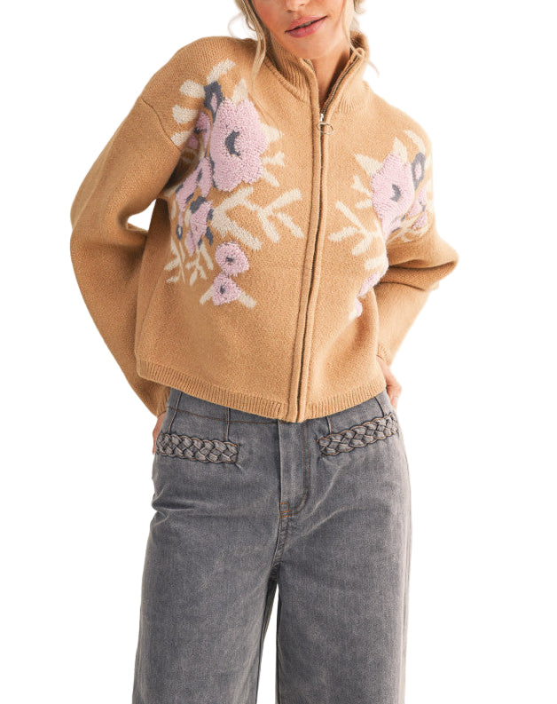 Your outfits will always be casually cute when you've got this zip-up sweater cardigan! Soft and cozy knit shapes long puff sleeves that frame a bodice with a ribbed stand collar, a zip-up closure, and semi-cropped relaxed bodice. Stunning floral knit design gives this cardigan the extra "oomph" your closet needs!